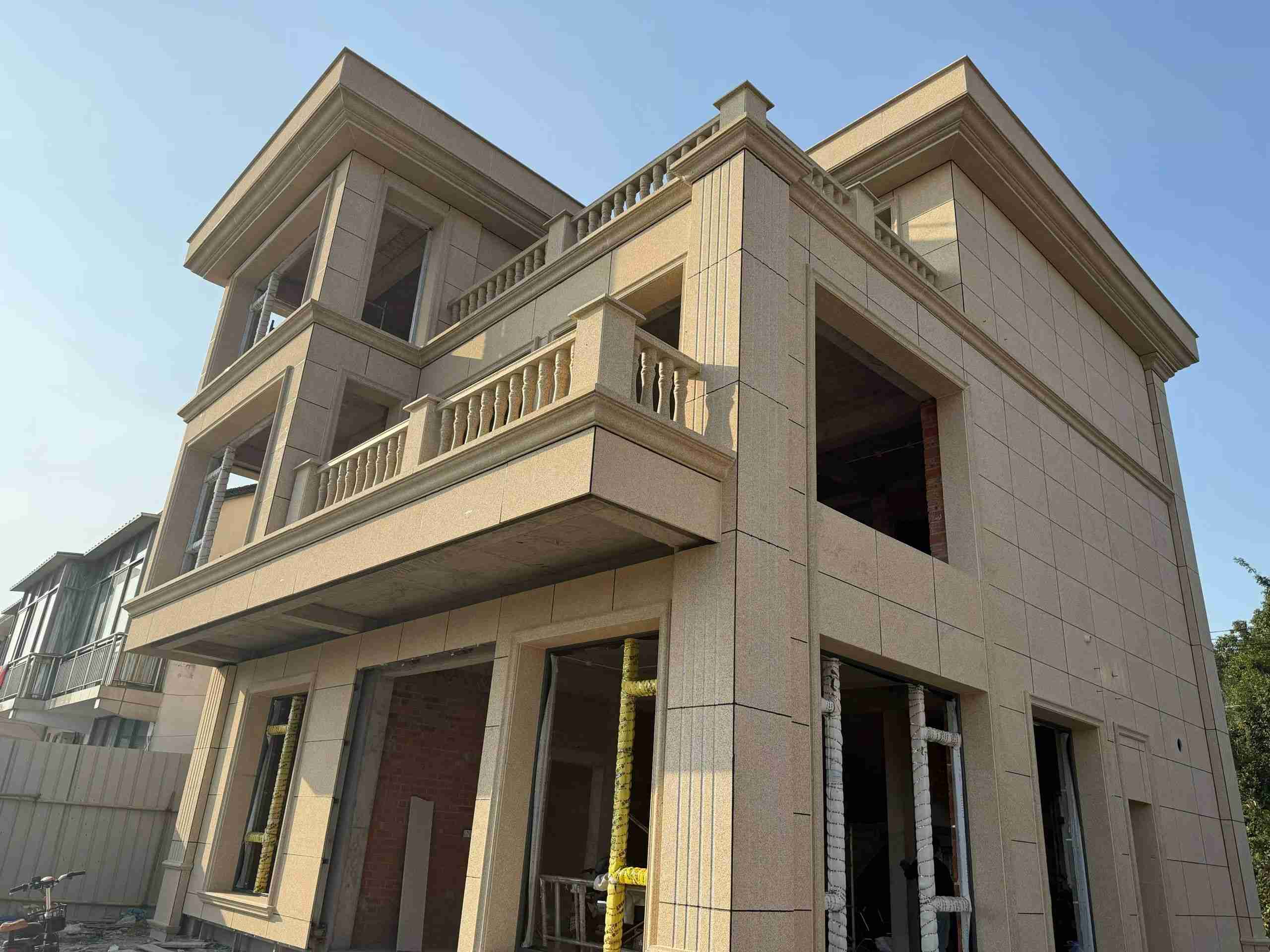 成都 黄金麻花岗岩石材荔枝面外墙干挂效果展示